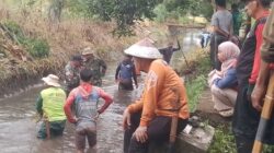 Peduli Lingkungan, Koramil 01/Panca Lautang Bersama Masyarakat Bersihkan Irigasi Bilokka